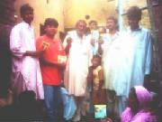 Group Photo of Holy Bible CD's in a unreached area