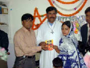 Bible School Student taking CD's & Stickers
